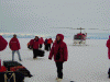 Taxi riders unloading luggage